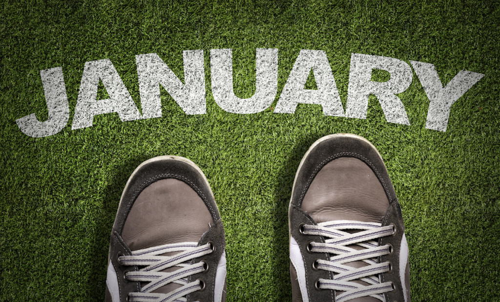 Top View of Sneakers on the grass with the text: January